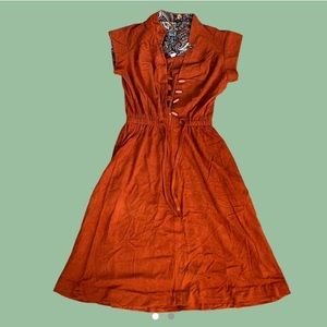 Vintage 70s orange dress
Elastic/tie at waist
Bamboo style buttons